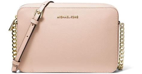 michael kors pale pink tote bag|Michael Kors crossbody pink bag.